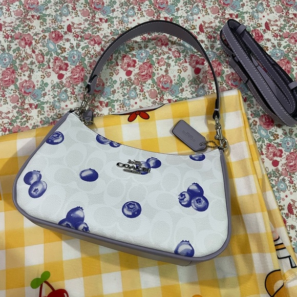 Coach Handbags - Coach White Crossbody Bag with Blue Blueberry Print